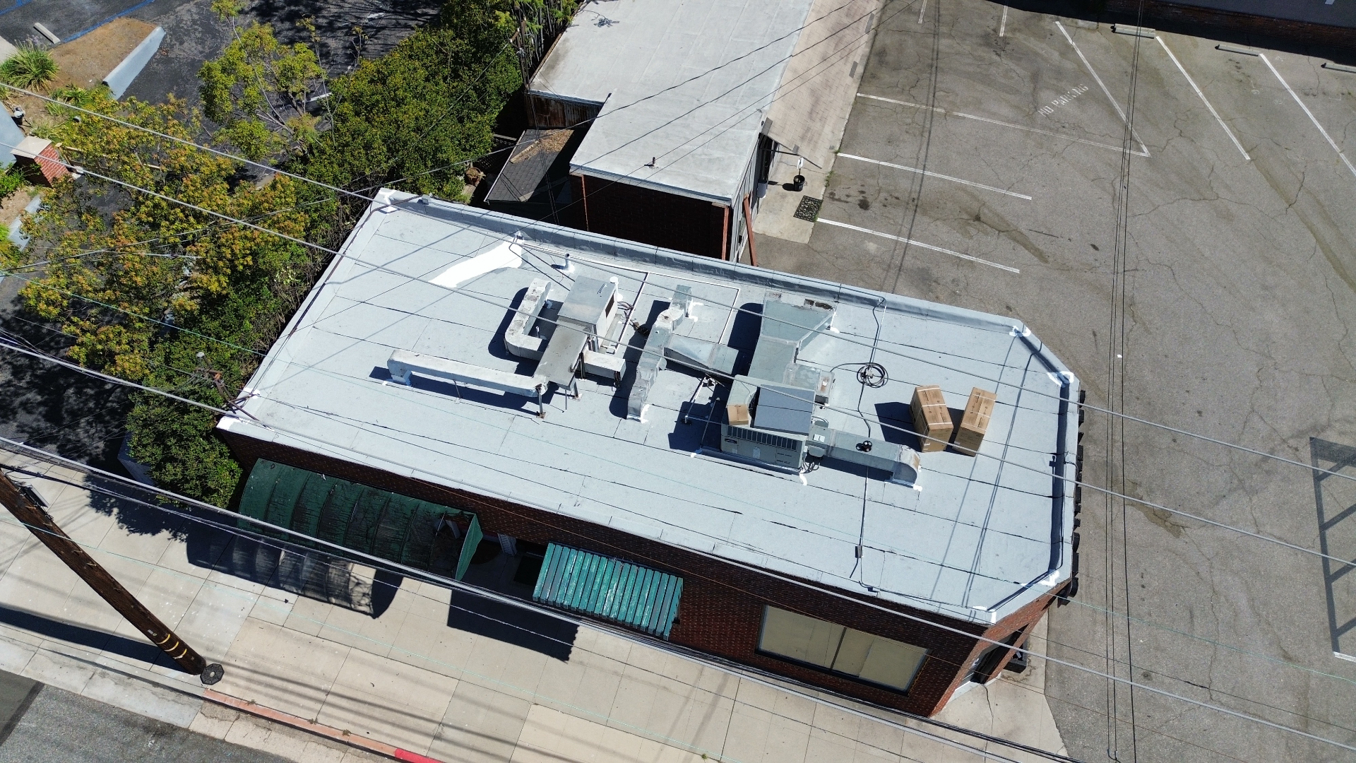 Commercial flat roof after Dena Roofing Pros restoration